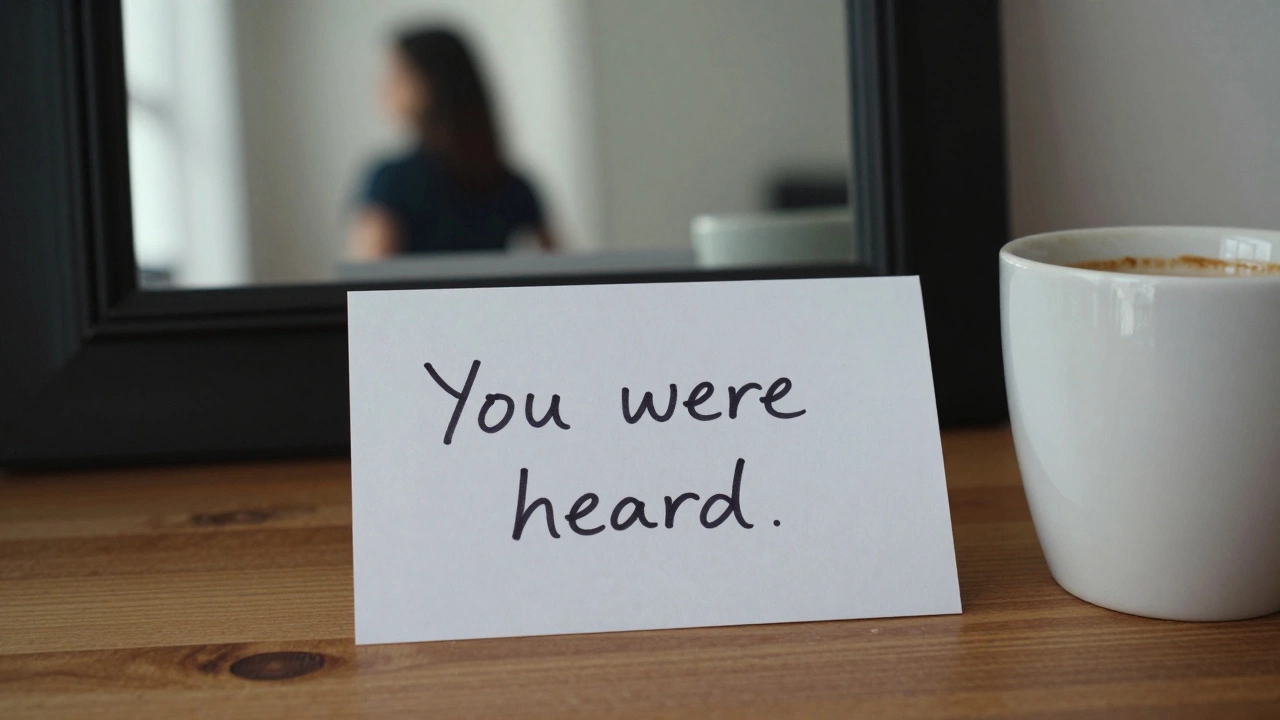 A handwritten note on stationery beside an untouched cup of coffee, reflection of a woman turning away in a mirror.